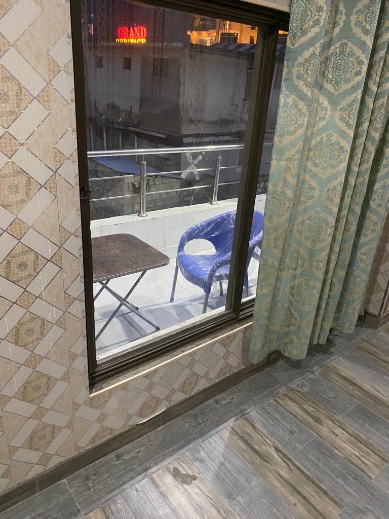 Room with private balcony seating