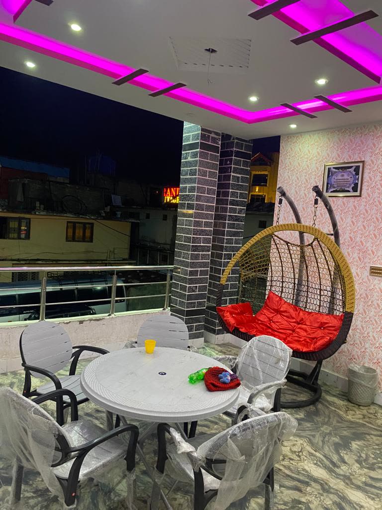 Rooftop terrace at Inside Mountains Hotel Naran at night